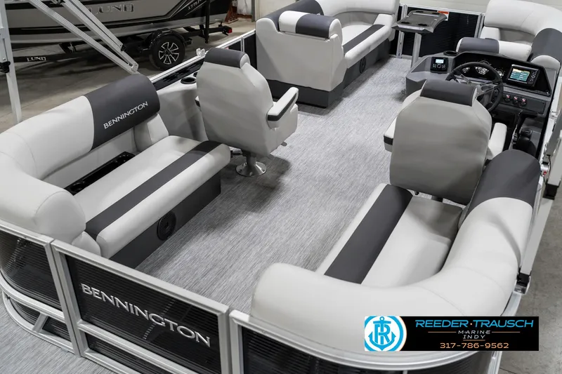 Slide: The Image of 2025 Bennington 20 SSR pontoon boat interior with plush seating and modern design. - 15