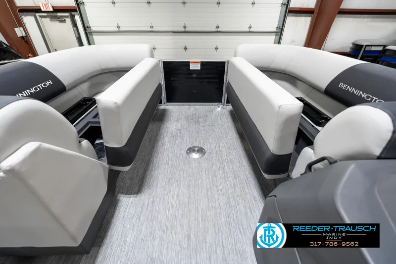 Slide: The Image of 2025 Bennington 20 SSR pontoon boat interior with gray seating and flooring. - 24