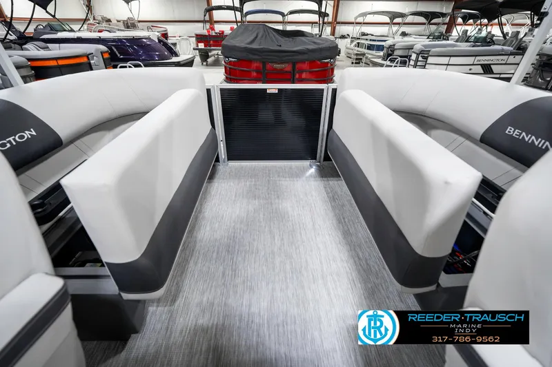 Slide: The Image of 2025 Bennington 20 SSR pontoon boat interior with gray seating and flooring. - 28