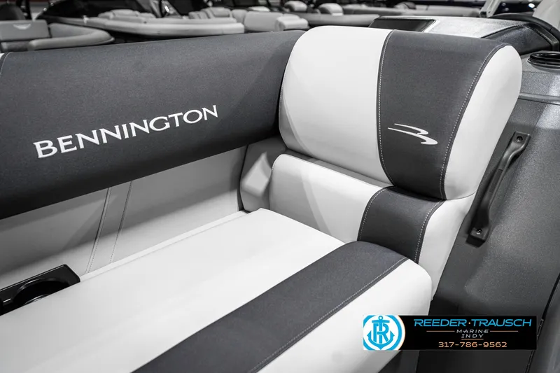 Slide: The Image of 2025 Bennington 20 SSR boat interior with sleek black and white seating design. - 39