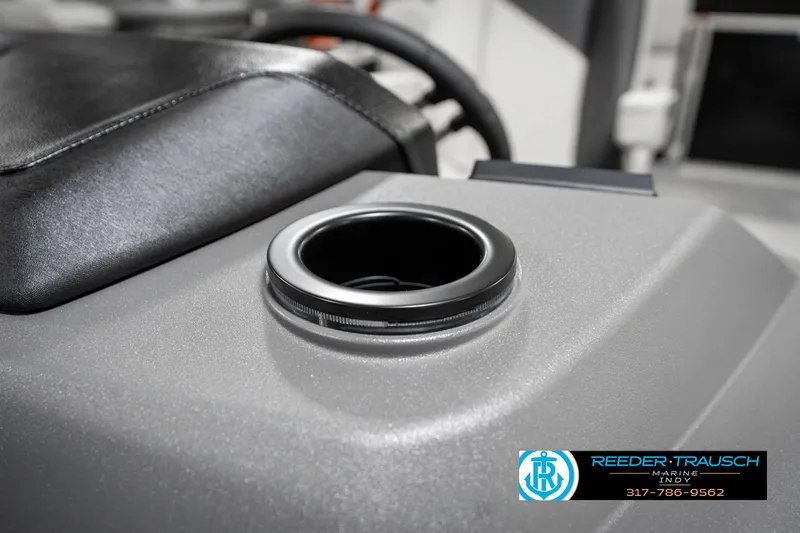 Slide: The Image of Cup holder on 2025 Bennington 20 SSR boat console, featuring sleek design and black trim. - 44