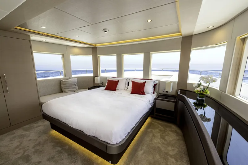 Slide: The Image of Luxurious bedroom interior of 2024 Nomad 75 SUV yacht with ocean view and modern decor. - 31