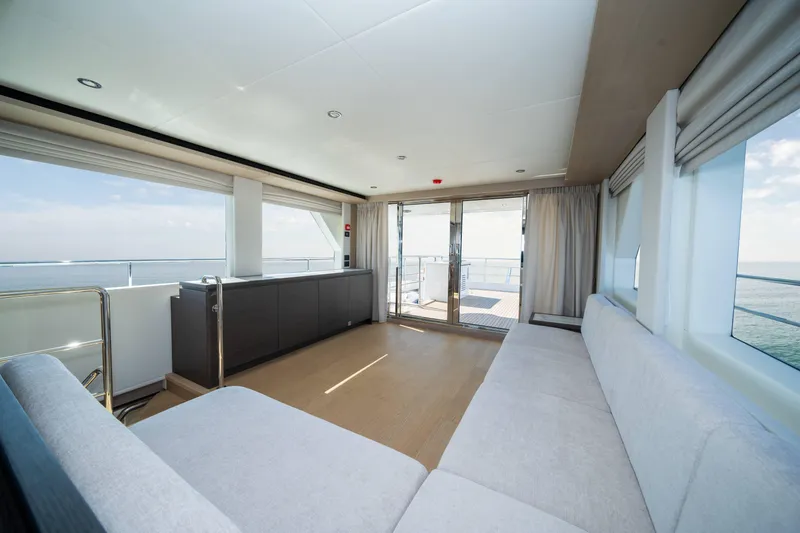 Slide: The Image of Luxurious interior of 2024 Nomad 75 SUV yacht with panoramic ocean views. - 33