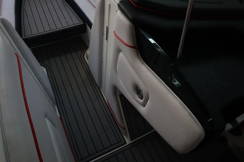 Slide: The Image of Interior of 2018 Nautique Super Air Nautique G25 boat with sleek seating and flooring. - 8