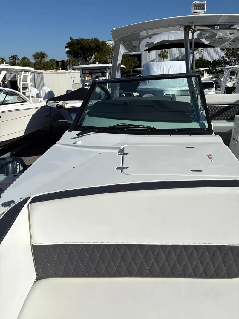 Slide: The Image of 2022 Monterey 385 Super Express boat with sleek design and spacious seating. - 16