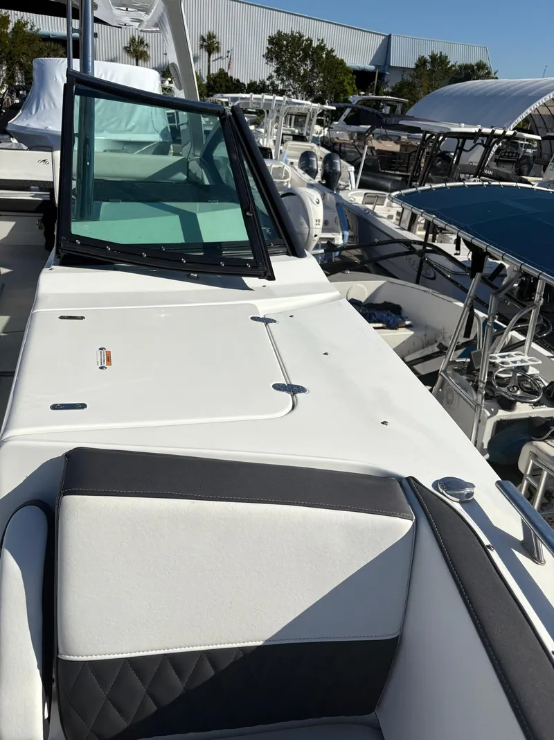 Slide: The Image of 2022 Monterey 385 Super Express boat with sleek design and modern features. - 18