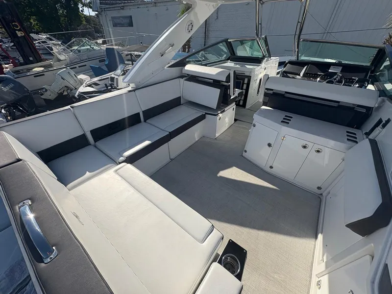 Slide: The Image of 2022 Monterey 385 Super Express boat interior with spacious seating and modern design. - 25