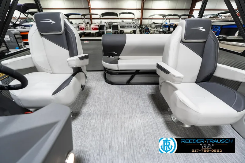 Slide: The Image of 2025 Bennington 22 SSB boat interior with modern seating and sleek design. - 17