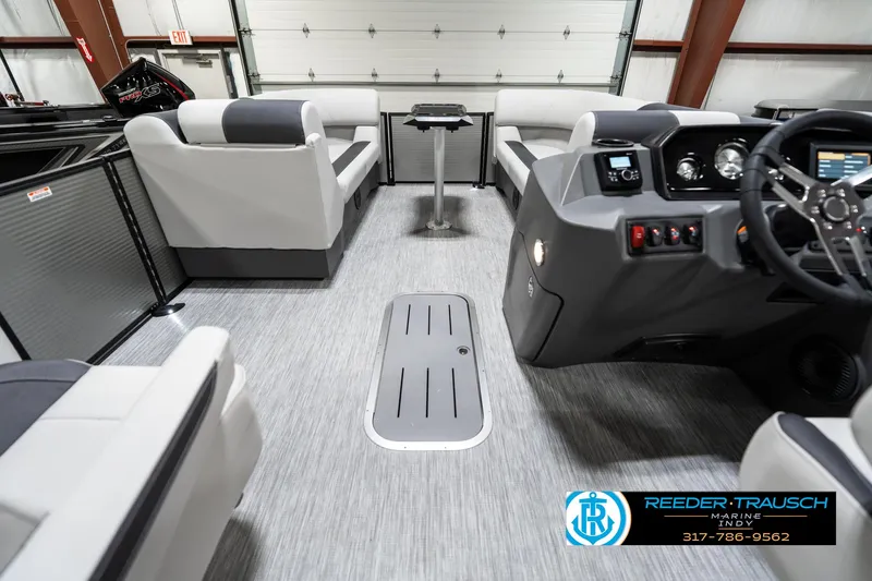 Slide: The Image of Interior of 2025 Bennington 22 SSB pontoon boat with modern seating and control panel. - 20
