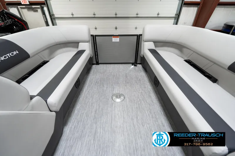 Slide: The Image of 2025 Bennington 22 SSB boat interior with gray seating and flooring. - 22
