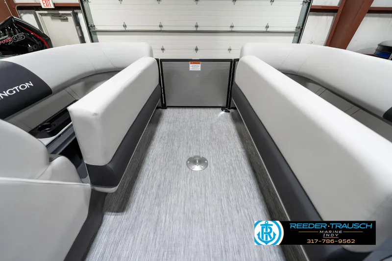 Slide: The Image of 2025 Bennington 22 SSB boat interior with gray seating and flooring. - 23