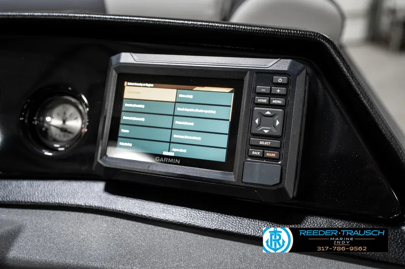 Slide: The Image of Garmin display on 2025 Bennington 22 SSB boat dashboard, featuring navigation controls. - 36