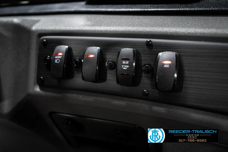 Slide: The Image of Control panel of 2025 Bennington 22 SSB boat with labeled switches. - 37