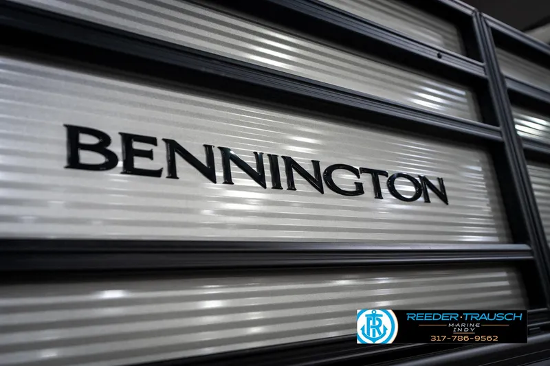 Slide: The Image of Close-up of 2025 Bennington 22 SSB boat logo on metallic surface. - 47