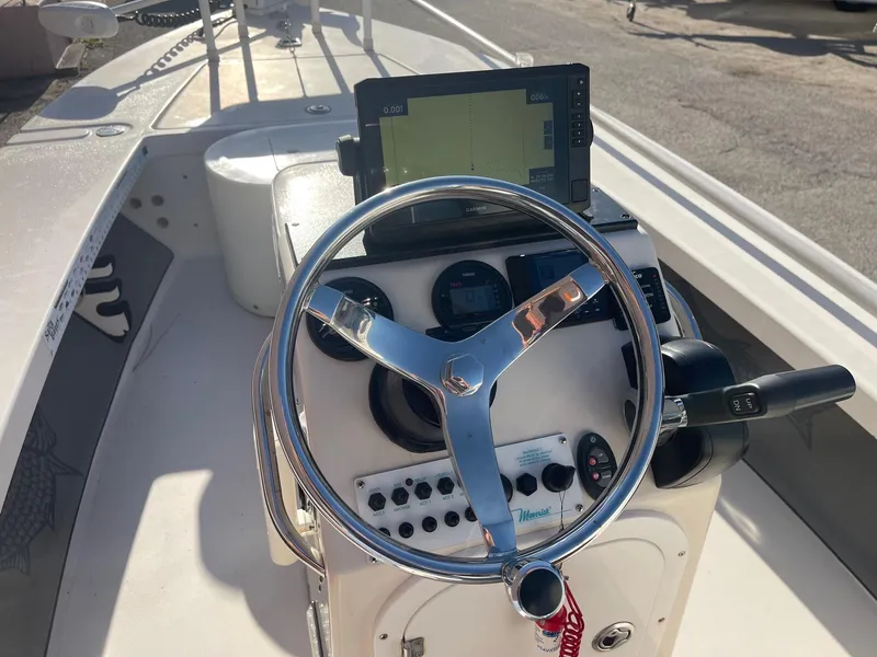 Slide: The Image of Steering console of a 2006 Maverick Mirage 17HPX-Tunnel boat with navigation equipment. - 8