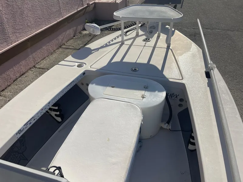 Slide: The Image of 2006 Maverick Mirage 17HPX-Tunnel boat deck with storage compartments and seating. - 9