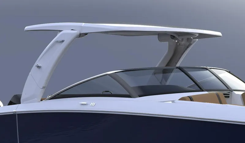 Slide: The Image of 2025 Four Winns H9C boat with sleek design and modern canopy. - 14