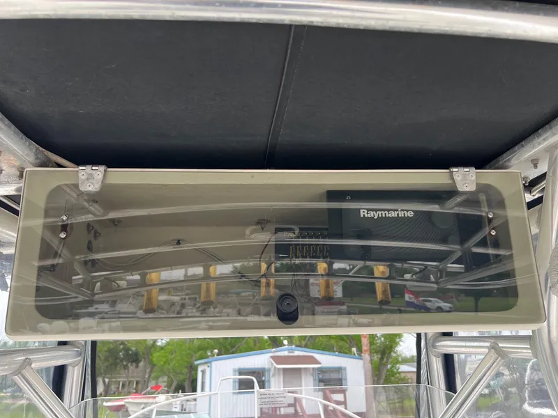 Slide: The Image of 1998 Boston Whaler 26 Outrage with Raymarine electronics, interior view. - 11
