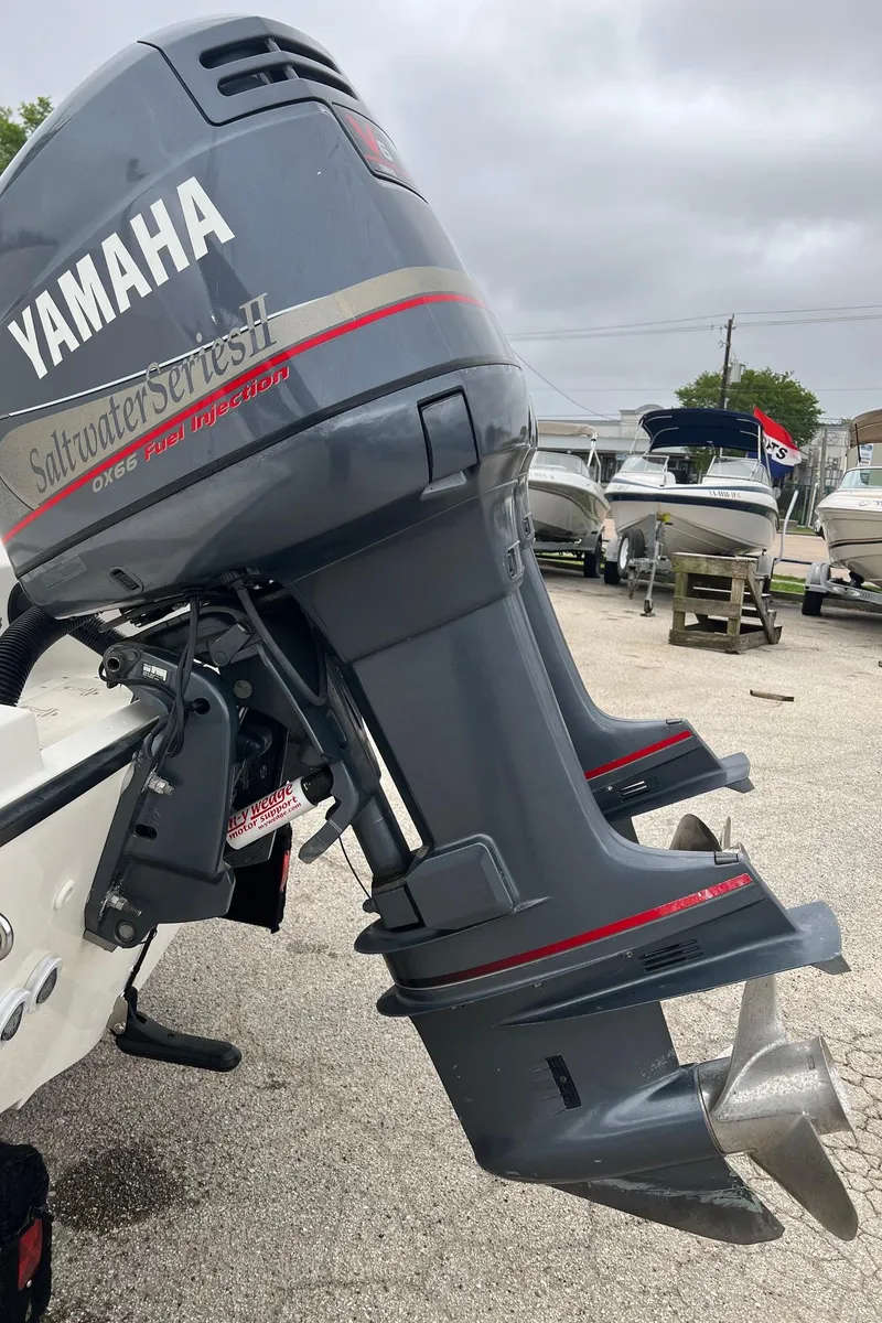 Slide: The Image of 1998 Boston Whaler 26 Outrage with Yamaha Saltwater Series II outboard motor. - 20