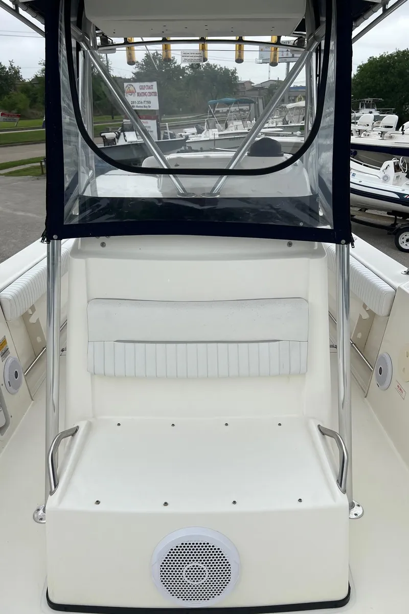 Slide: The Image of 1998 Boston Whaler 26 Outrage boat interior with seating and speaker. - 30