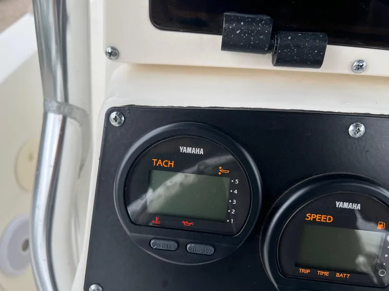 Slide: The Image of Yamaha tachometer and speedometer on 1998 Boston Whaler 26 Outrage boat dashboard. - 9