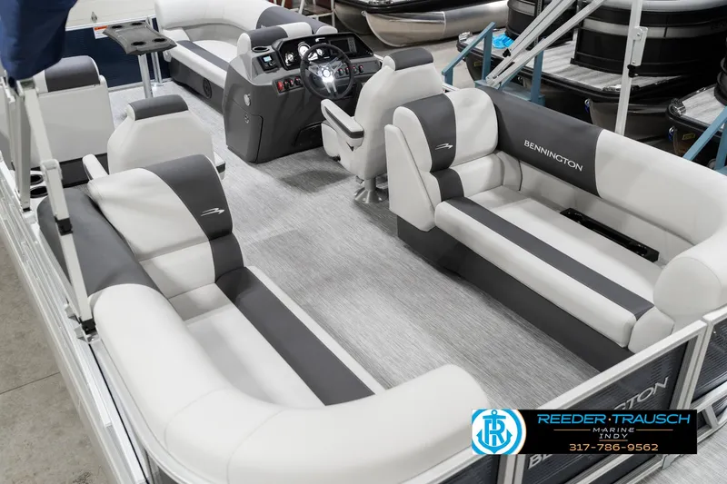 Slide: The Image of 2025 Bennington 22 SSR pontoon boat interior with luxurious seating and modern dashboard. - 15