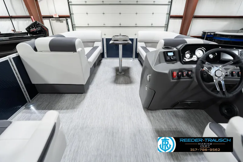 Slide: The Image of 2025 Bennington 22 SSR pontoon boat interior with modern seating and steering console. - 20