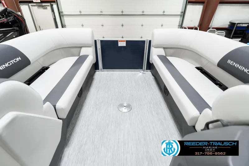 Slide: The Image of 2025 Bennington 22 SSR pontoon boat interior with gray seating and flooring. - 22