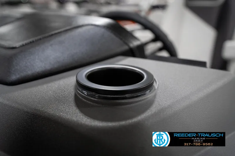 Slide: The Image of 2025 Bennington 22 SSR boat cup holder detail with Reeder-Trausch logo. - 39