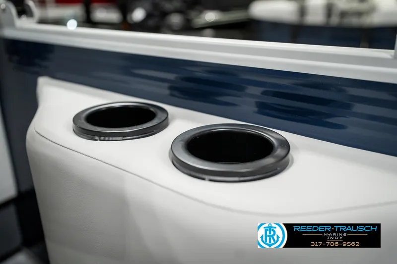 Slide: The Image of 2025 Bennington 22 SSR boat cup holders with sleek design and blue accents. - 40