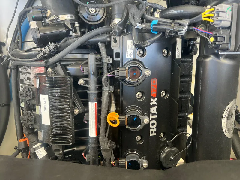 Slide: The Image of 2023 Scarab 165 ID engine featuring a Rotax 1503 power unit with visible components and wiring. - 8