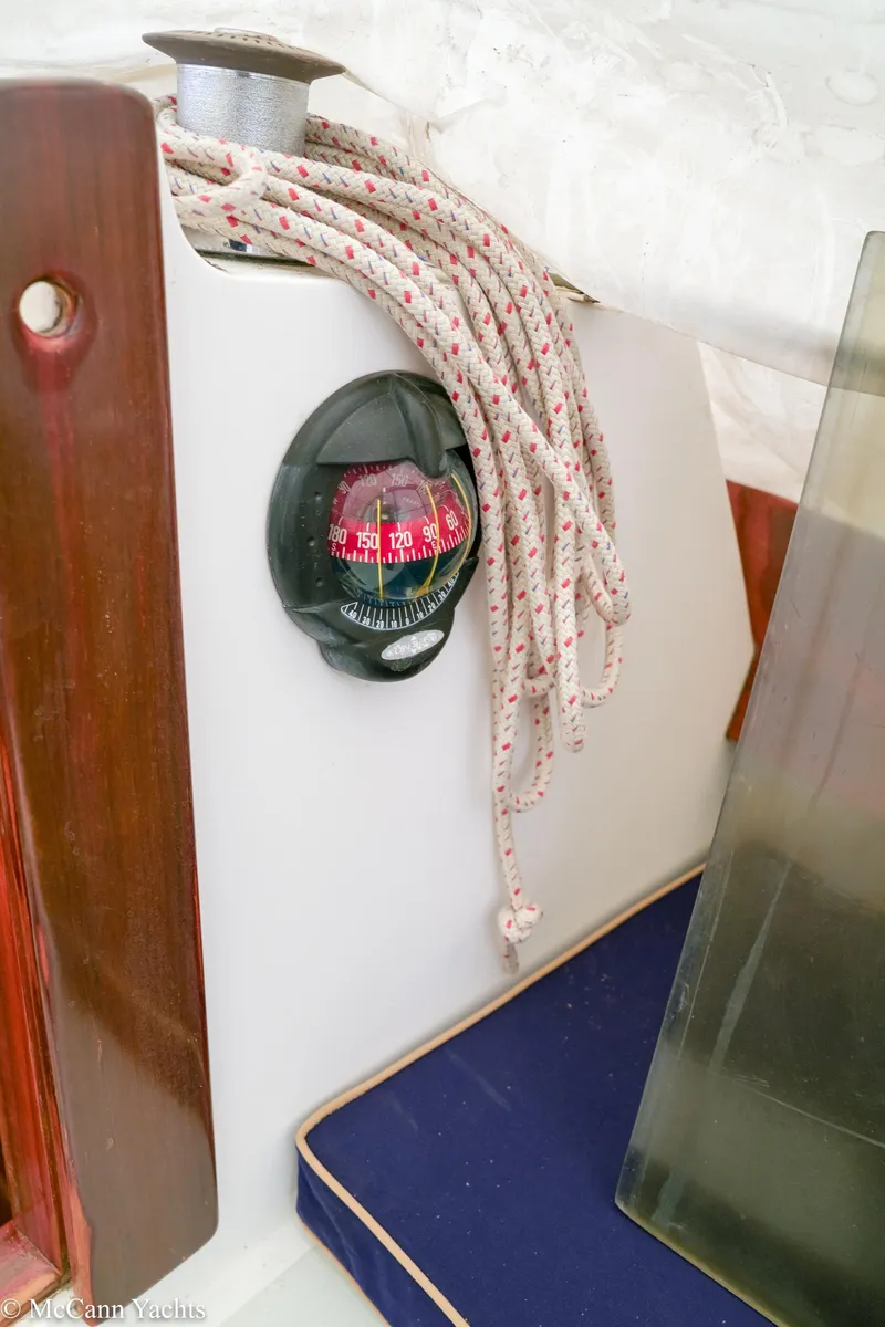 Slide: The Image of Compass and ropes on 2002 Alerion Express 28 sailboat interior. - 22
