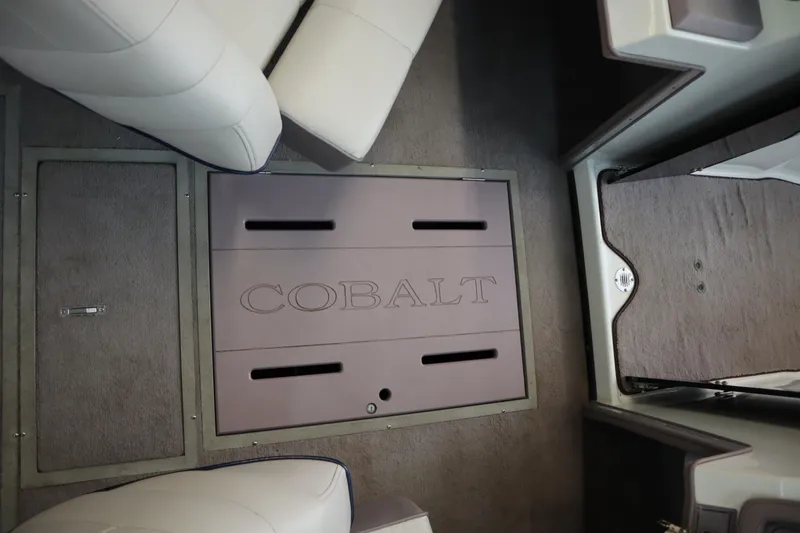 Slide: The Image of Interior of a 1996 Cobalt 220 boat with branded flooring. - 9