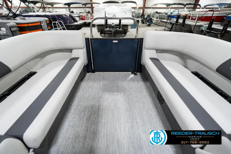 Slide: The Image of 2025 Bennington 22 SSR pontoon boat interior with gray seating and flooring. - 18