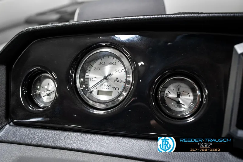 Slide: The Image of Dashboard gauges of 2025 Bennington 22 SSR boat, featuring RPM and fuel indicators. - 33