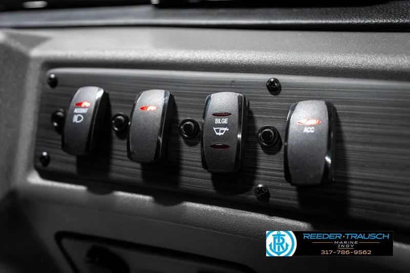 Slide: The Image of Control panel of 2025 Bennington 22 SSR boat with labeled switches. - 35