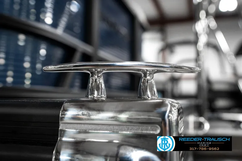 Slide: The Image of Close-up of a 2025 Bennington 22 SSR boat cleat in a showroom setting. - 47