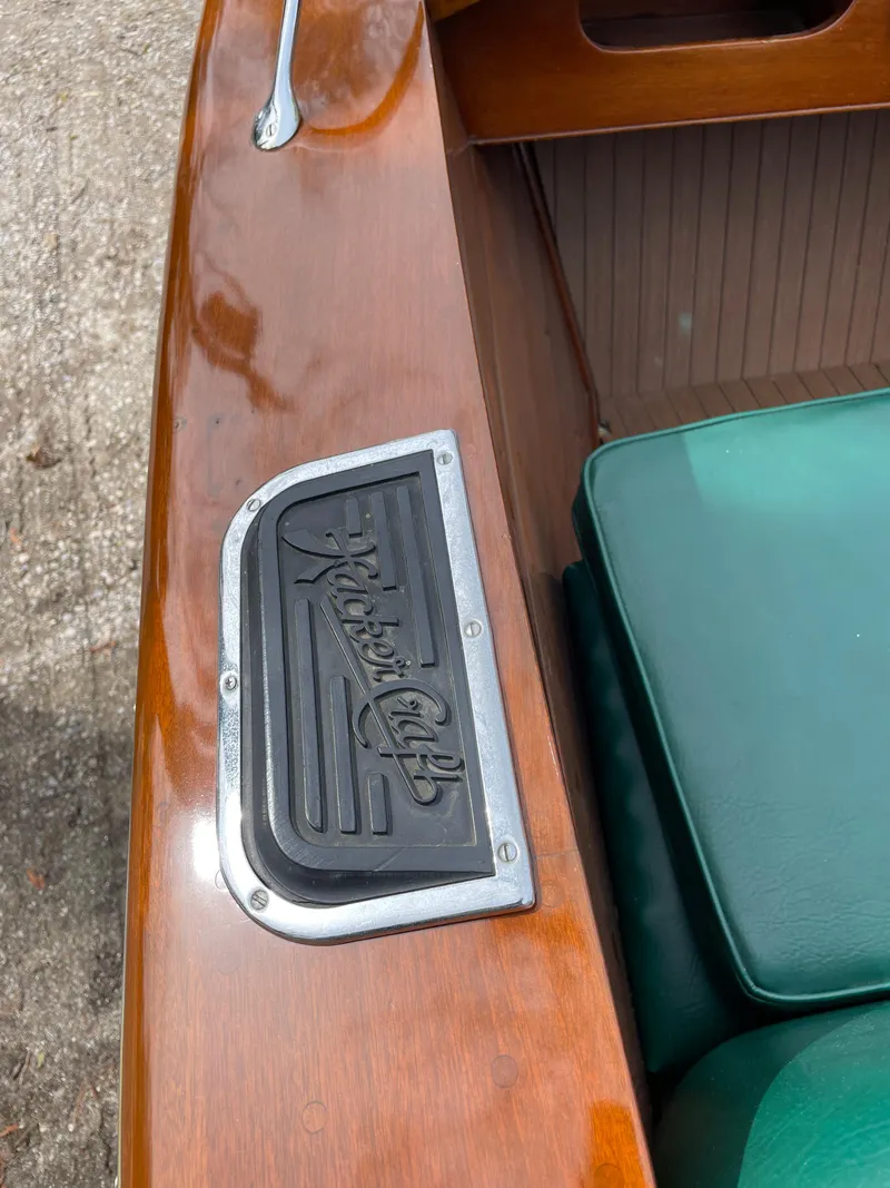 Slide: The Image of 1951 Hacker-Craft 22 Utility boat with wooden finish and green seating. - 6