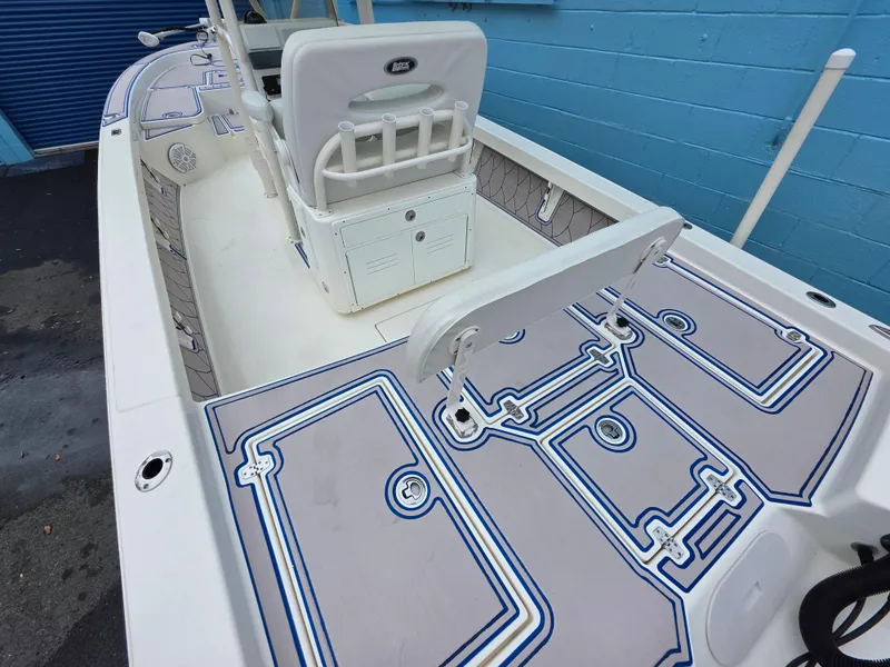 Slide: The Image of 2015 Pathfinder 2600 HPS boat interior with custom deck design and seating. - 14