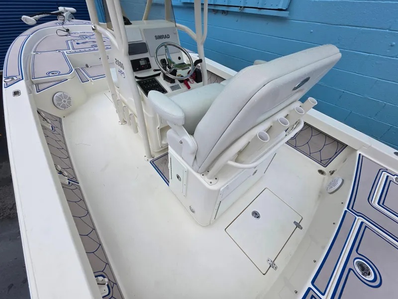 Slide: The Image of 2015 Pathfinder 2600 HPS boat interior with seating and control panel. - 15