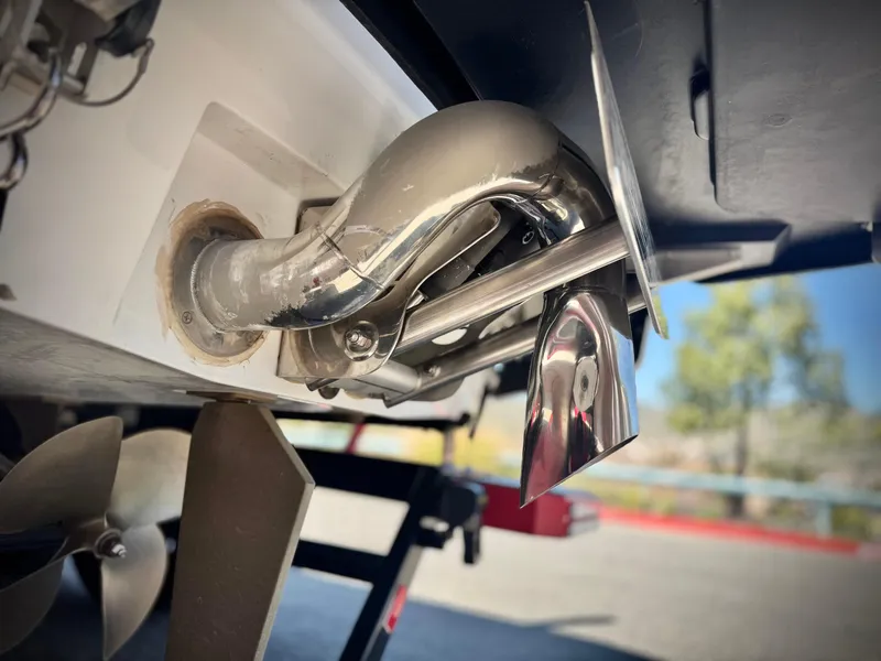 Slide: The Image of Close-up of 2021 Malibu Wakesetter 25 LSV boat exhaust and propeller system. - 11