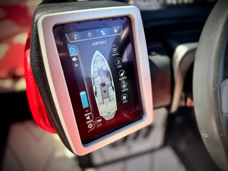 Slide: The Image of Touchscreen control panel of a 2021 Malibu Wakesetter 25 LSV boat, displaying navigation and settings. - 40