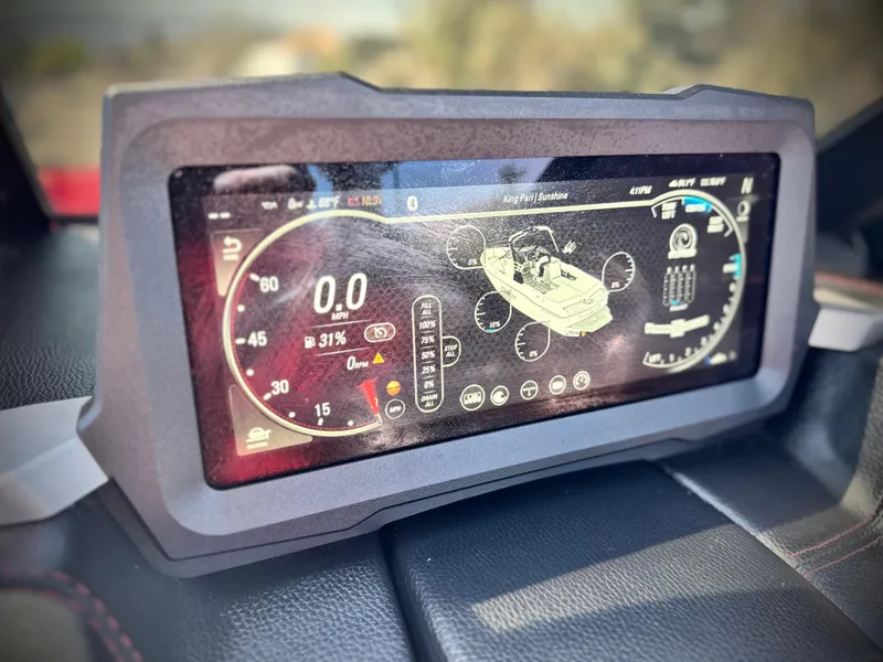 Slide: The Image of Dashboard display of 2021 Malibu Wakesetter 25 LSV boat, showing speed and system indicators. - 41