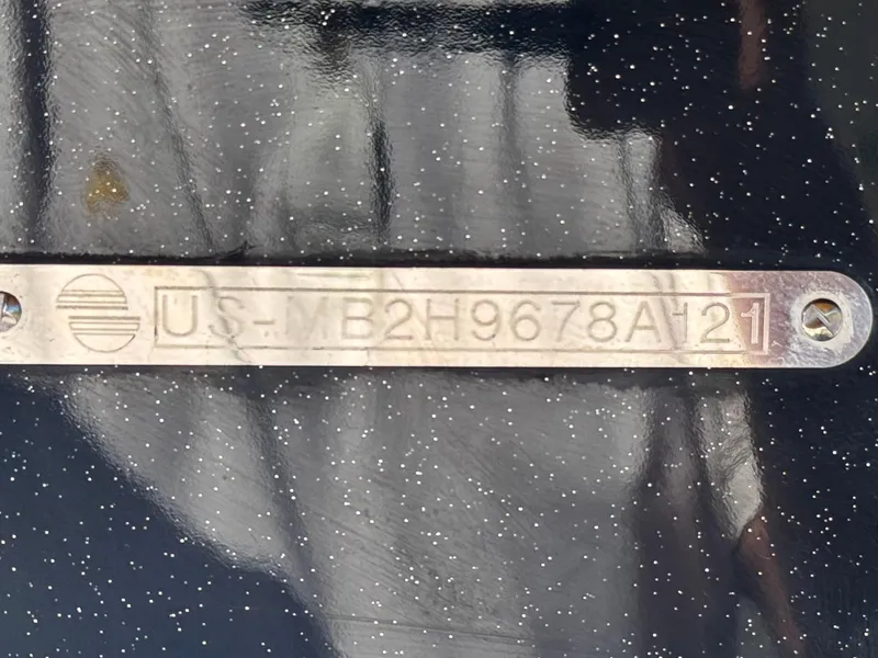 Slide: The Image of 2021 Malibu Wakesetter 25 LSV hull identification number on a speckled surface. - 47