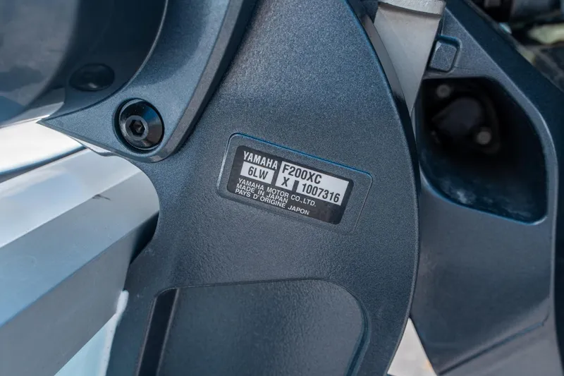 Slide: The Image of Yamaha F200XC engine detail on 2025 Sea Hunt Ultra 229 boat. - 29