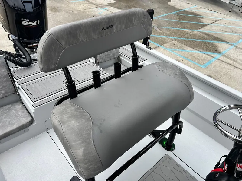 Slide: The Image of Avid 23 Mag 2023 boat interior with Yamaha 250 engine and seating. - 5