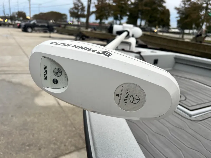Slide: The Image of Minn Kota Riptide i-Pilot trolling motor on 2023 Avid 23 Mag boat. - 9