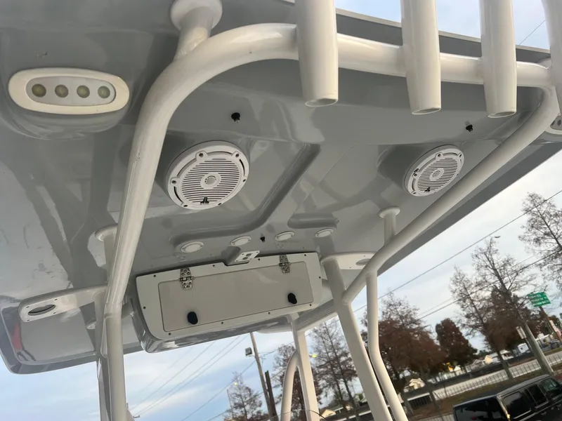 Slide: The Image of 2022 Sea Hunt BX 25 BR boat roof with speakers and rod holders. - 12
