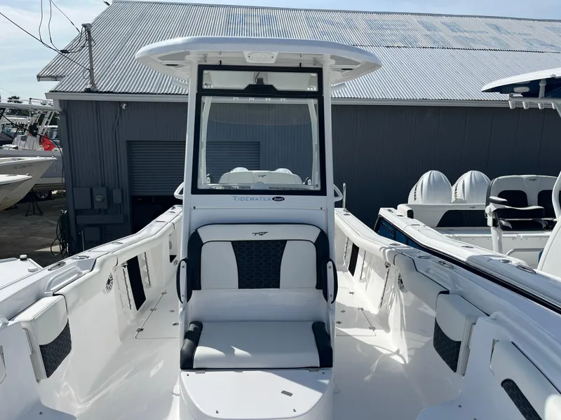 Slide: The Image of 2024 Tidewater 256 CC Adventure boat with sleek design and spacious seating. - 10