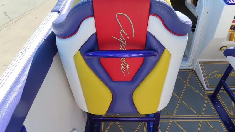 Slide: The Image of Colorful seat on a 2003 Cigarette 38 Top Gun boat, featuring vibrant upholstery design. - 6